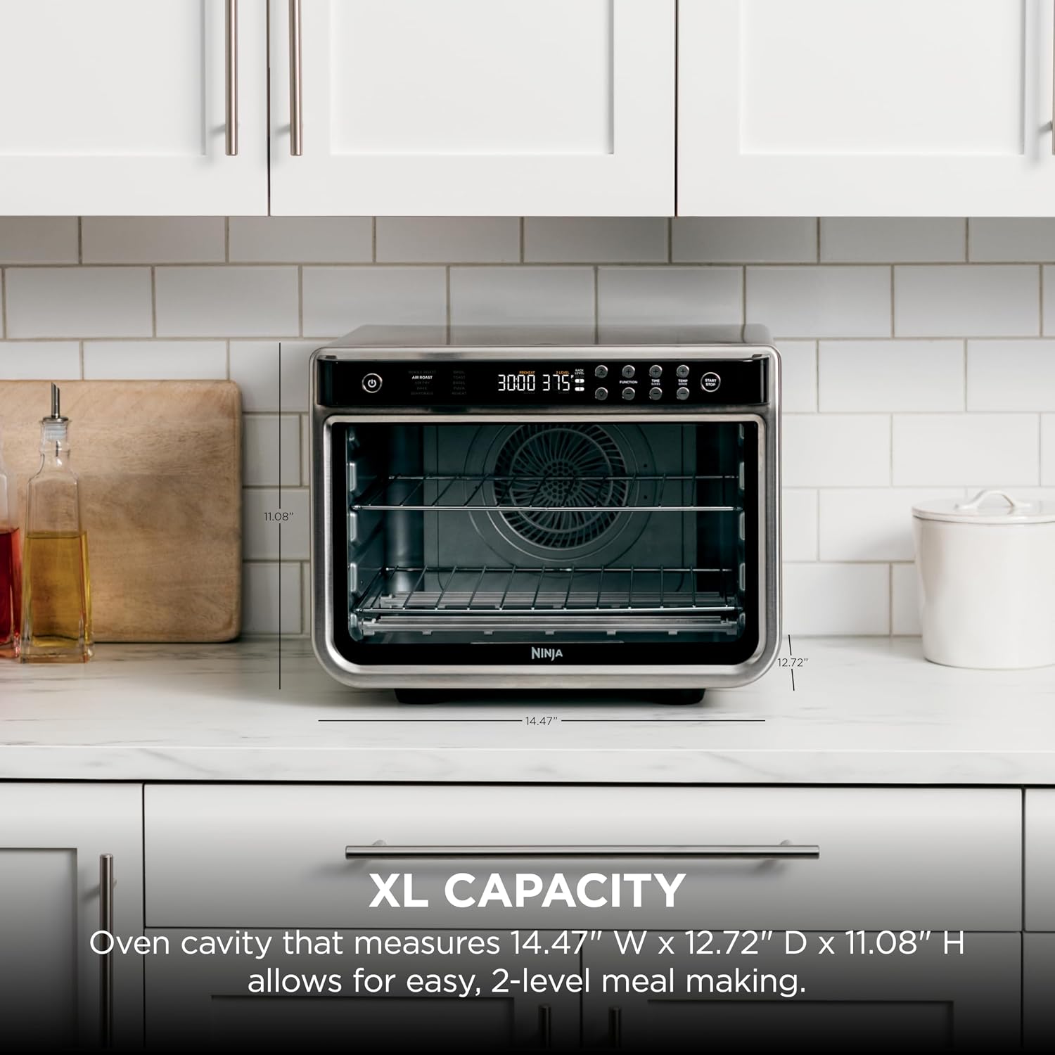 Ninja Foodi XL Pro air fryer oven close-up showing digital display and stainless steel control panel