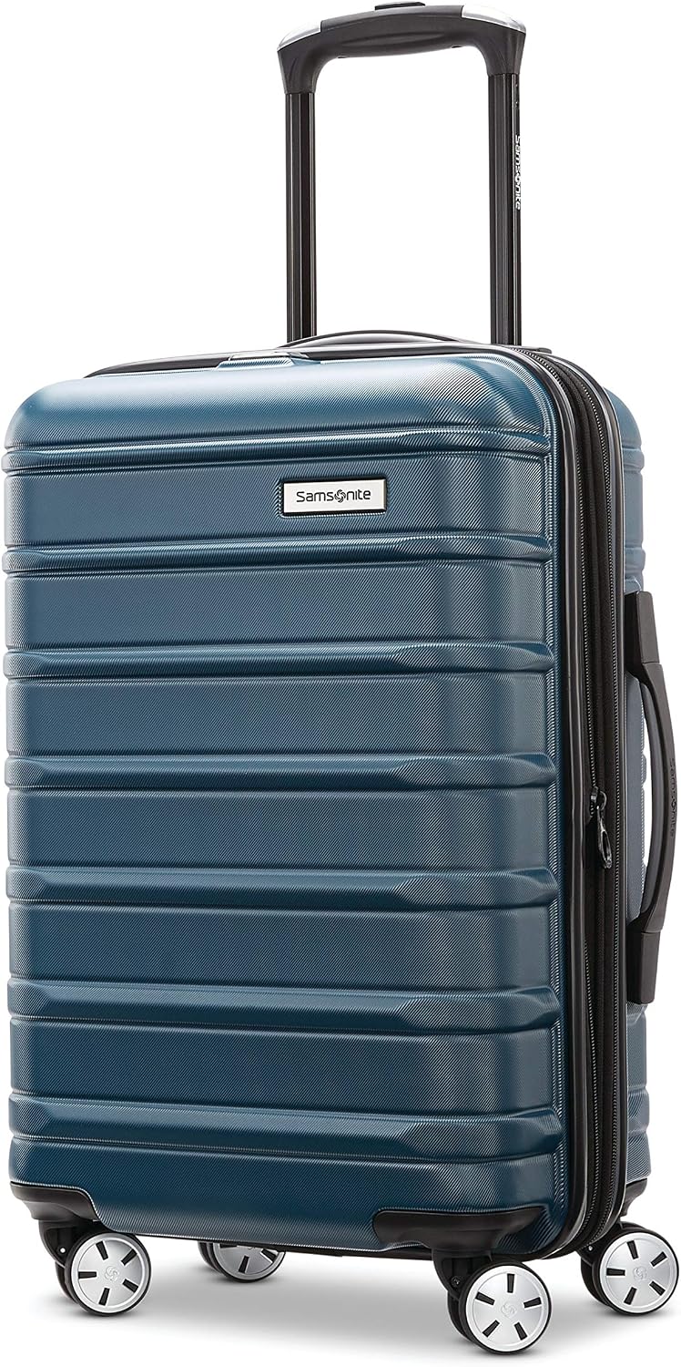 Close-up of Omni 2 carry-on handle grip and spinner wheel with chrome details and textured Nova Teal fabric